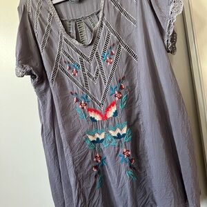 Johnny was flowered blouse.